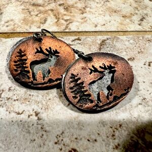 Hand made copper and metal earrings. Come in a glass jar for easy gifting.